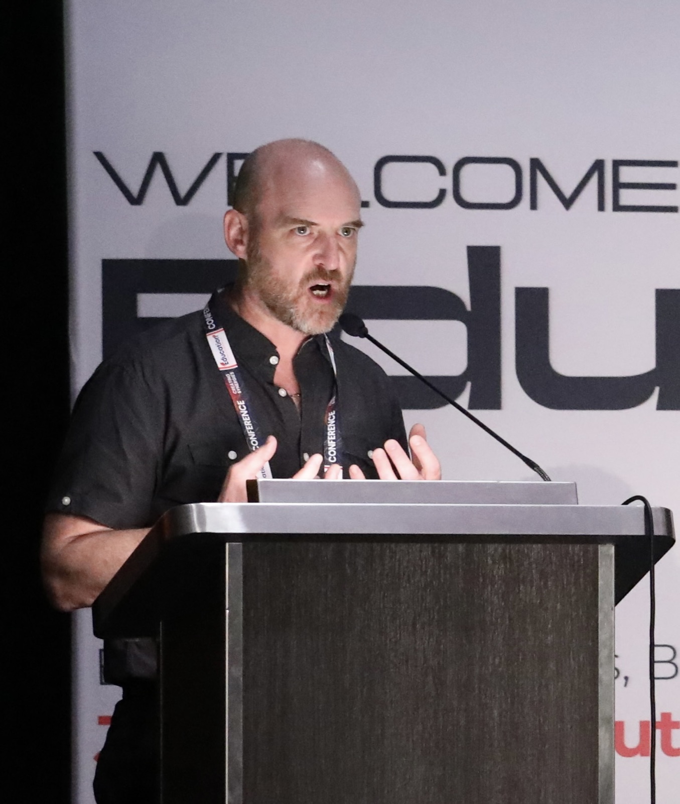 Colin Boguski speaking at an education conference